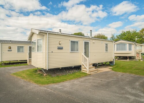 12ft-wide luxury caravan with one double and one twin.