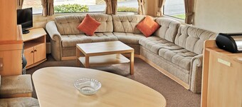 Spacious and comfortable 12ft-wide caravan with one double and two twin.