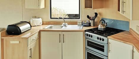 Geladeira, fogão, cooktop, torradeira