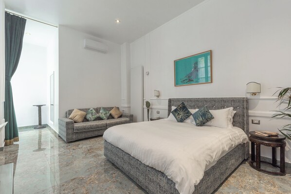 Premium bedding, down comforters, memory foam beds, in-room safe