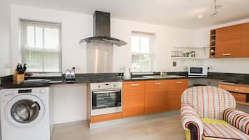 Fridge, electric kettle, toaster, cookware/dishes/utensils