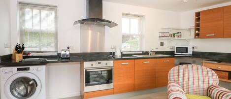 Fridge, electric kettle, toaster, cookware/dishes/utensils