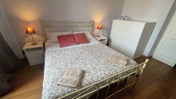 Premium bedding, desk, laptop workspace, free WiFi