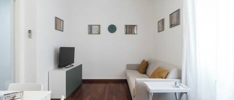 50-inch flat-screen TV with cable channels, TV