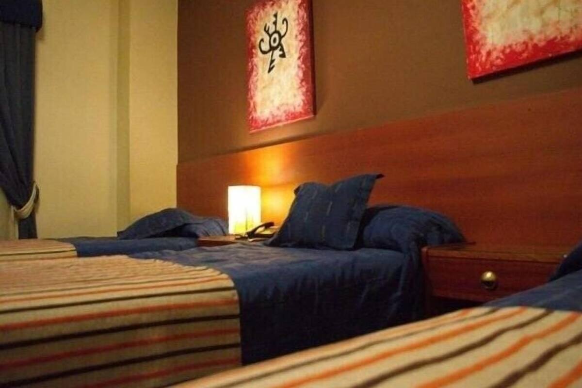 Standard Triple Room | Down comforters, in-room safe, desk, WiFi (free)