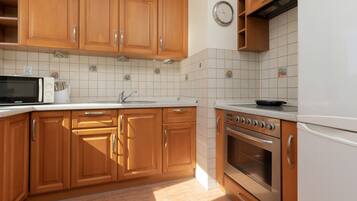 Apartment, 1 Bedroom, Balcony | Private kitchen | Microwave, dishwasher, electric kettle, toaster