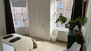 2 bedrooms, desk, iron/ironing board, travel crib