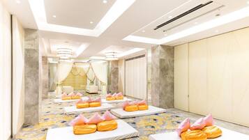 Relax in a stylish room with a large bed, mirror, and wardrobe.