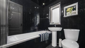 Superior House | Bathroom | Hair dryer, soap, shampoo
