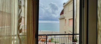 Maison de vacances Casa Conchiglia avec vue sur la mer et balcon.