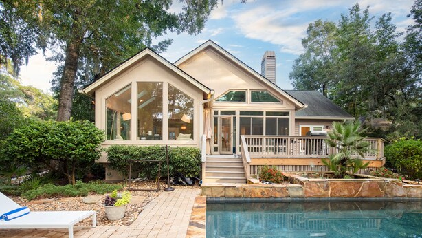 A house with a swimming pool, a covered patio, and a deck. - Hilton Head Retreat • Private Pool + Deck Dining + Near Beach | Hilton Lagoon (Hilton Head Island)