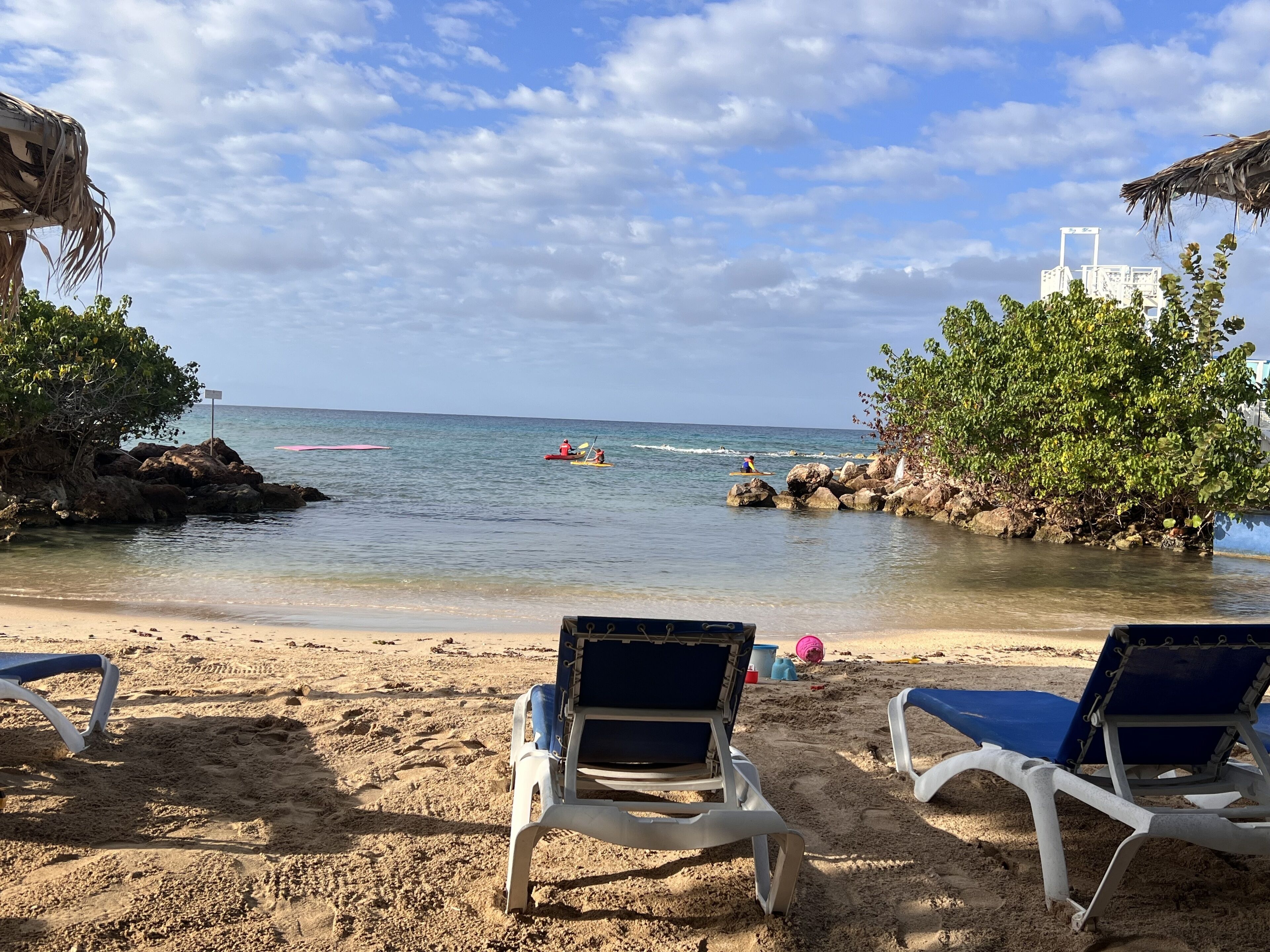 On the beach, sun loungers, beach towels