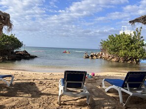 On the beach, sun loungers, beach towels - Sea Breeze Escape - Resort Condo in Runaway Bay (Saint Ann's Bay)