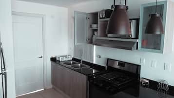 Microwave, oven, coffee/tea maker, cookware/dishes/utensils