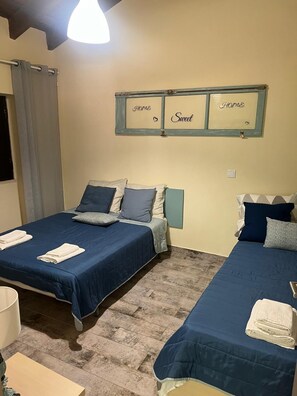 3 slaapkamers, een strijkplank/strijkijzer, wifi, beddengoed