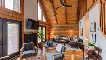 Smart TV, fireplace, books, music library