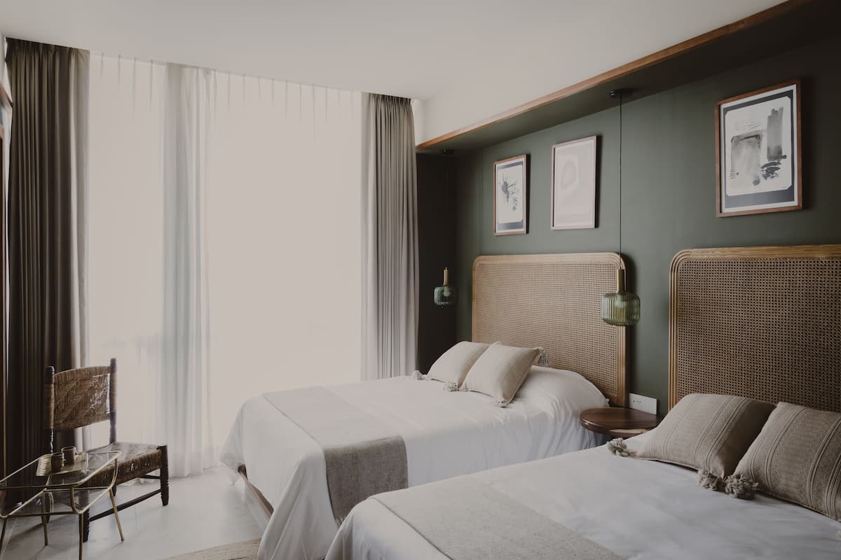 Premium bedding, down comforters, in-room safe, individually decorated