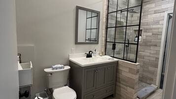 Shower, hair dryer, towels, soap