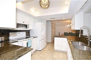 Fridge, microwave, oven, stovetop - Dynamic 3 bed/ 2 bath home with heated pool. (Vero Beach)