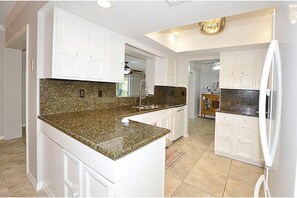 Fridge, microwave, oven, stovetop - Dynamic 3 bed/ 2 bath home with heated pool. (Vero Beach)