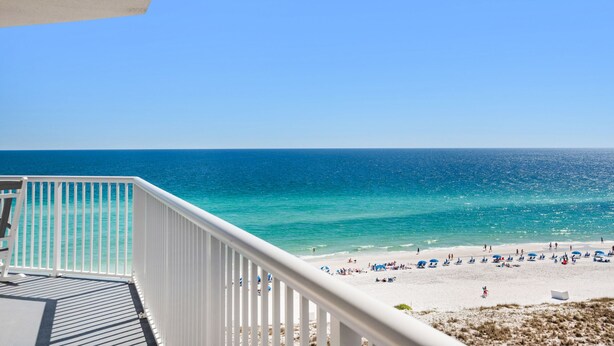 A balcony with a view of a beach and ocean. - 🌞Beachfront|Gulf Views|Pools|3BR Summerwind 804🌞 (Navarre Beach)