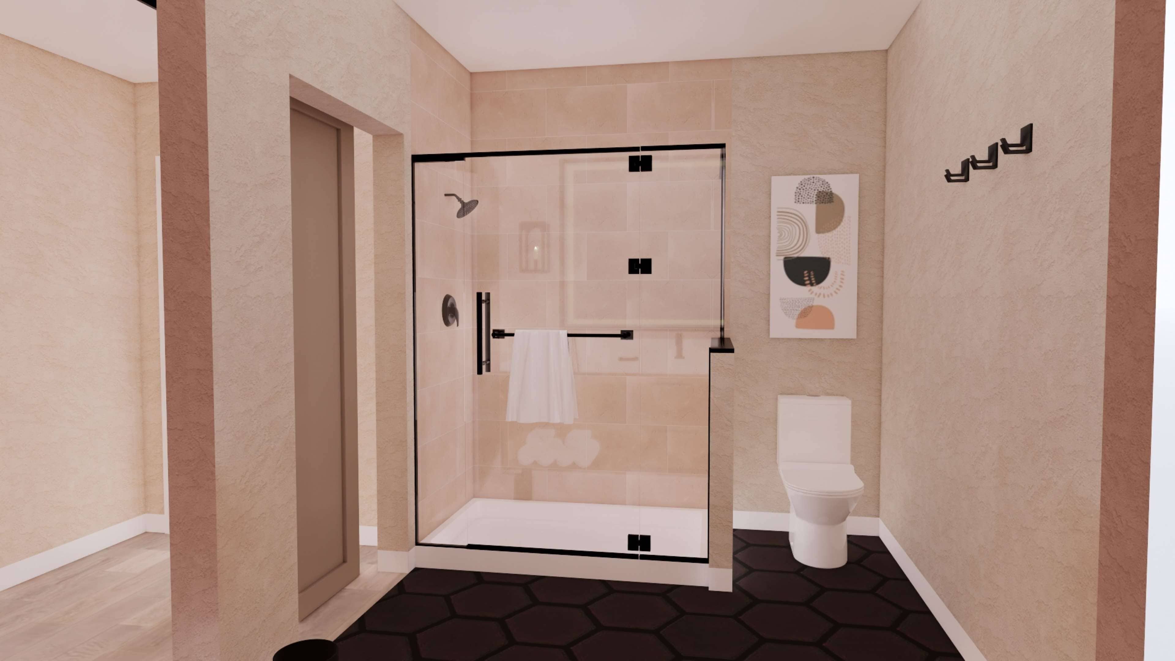 Een moderne badkamer met een douchecabine van glas, een toilet en een wastafel.