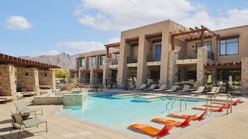 Outdoor pool, open 7:00 AM to 10:00 PM, free cabanas, pool umbrellas