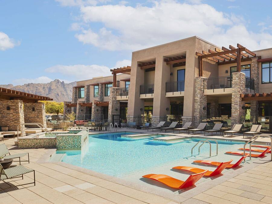 Outdoor pool, open 7:00 AM to 10:00 PM, free cabanas, pool umbrellas