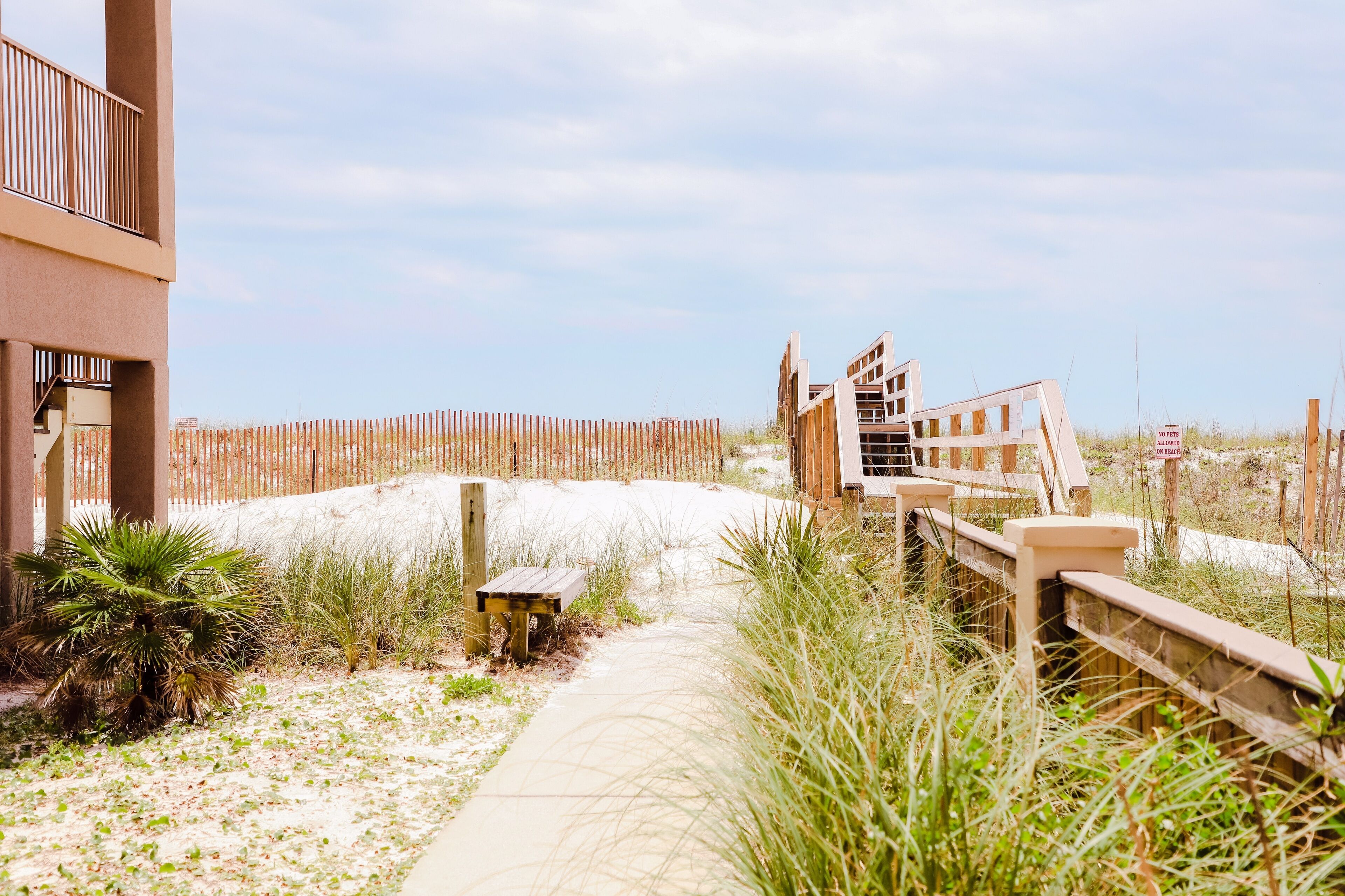 This boardwalk delivers you to white sand and turquoise waters!