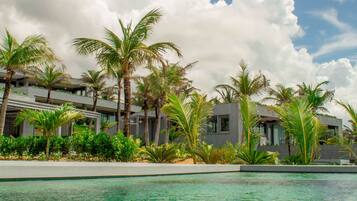 Outdoor pool, open 9:00 AM to 8:00 PM, sun loungers