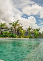 Outdoor pool, open 9:00 AM to 8:00 PM, sun loungers