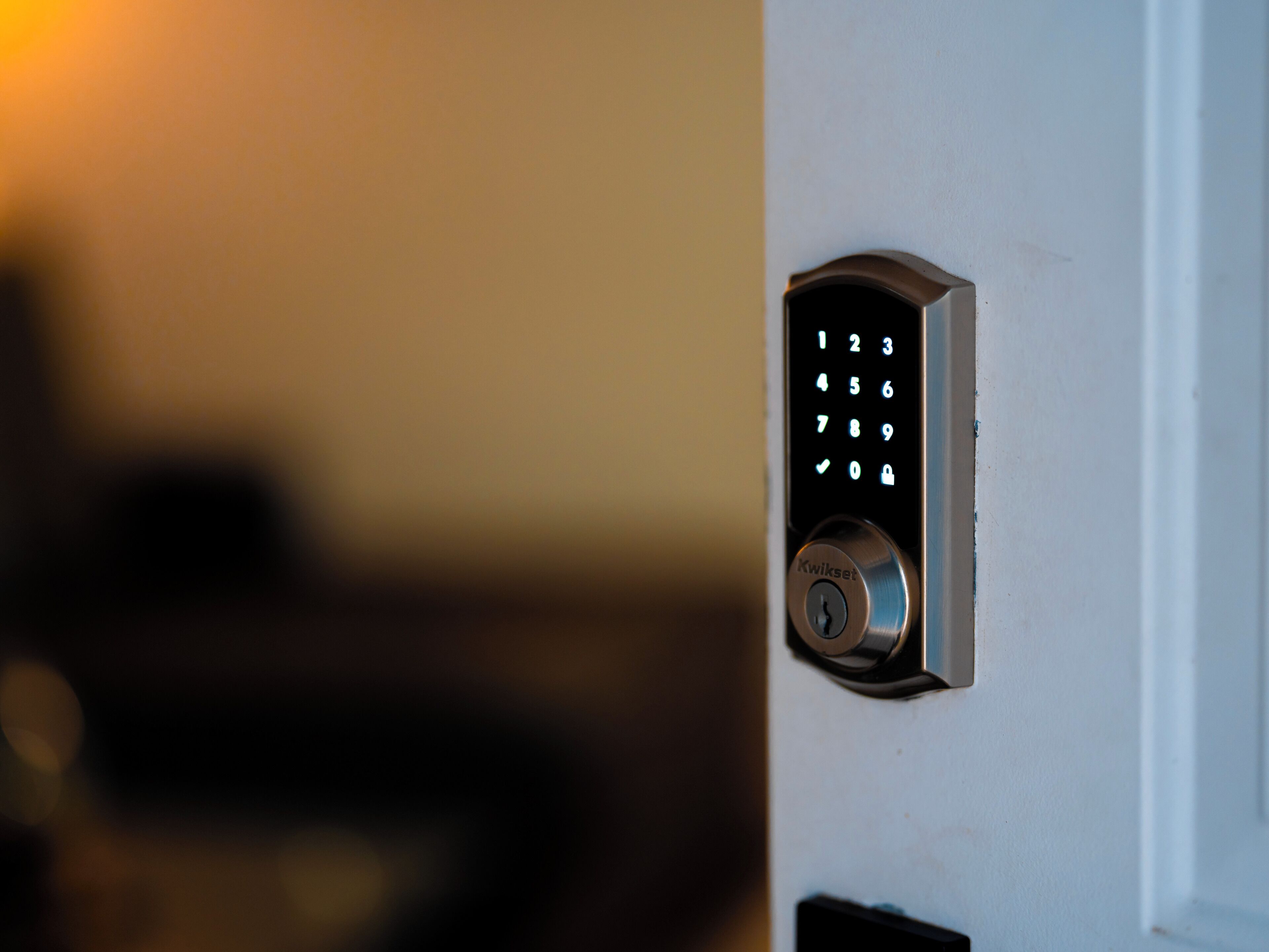 A door with a numeric keypad lock.
