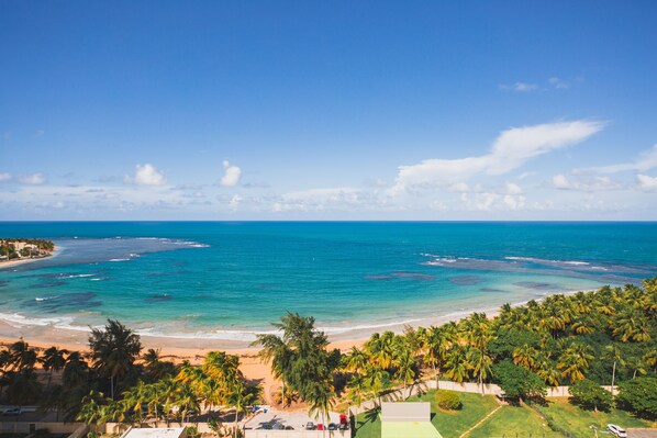 On the beach, sun loungers, beach towels