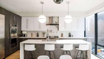 Fridge, coffee/tea maker, cookware/dishes/utensils