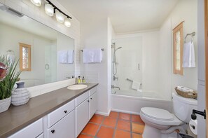 Bathtub, hair dryer, towels