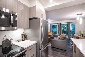 Alpine Escape | Private kitchen | Full-size fridge, microwave, oven, stovetop - Alpine Escape by Revelstoke Vacations (Revelstoke)