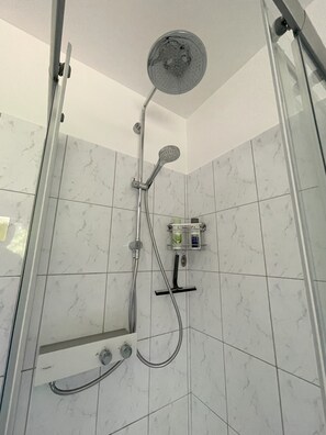 Bathtub, hair dryer, towels