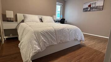 1 bedroom, desk, iron/ironing board, travel crib