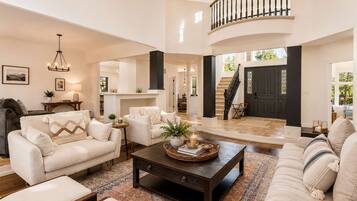Smart TV, fireplace, books, offices