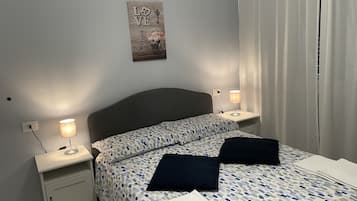 Basic Room | Premium bedding, down comforters, memory foam beds