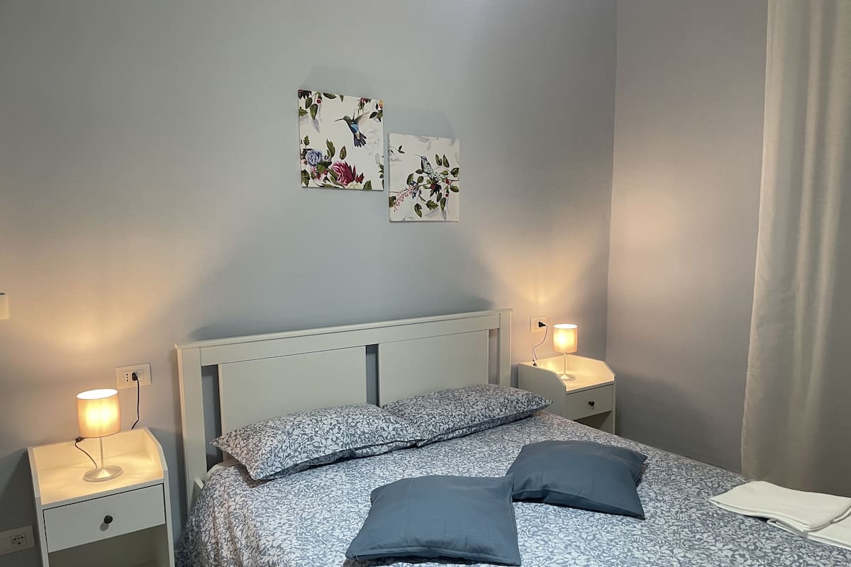 Habitación Deluxe | Ropa de cama de alta calidad, edredón y camas con efecto memoria