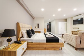 Suite estudio Deluxe | Escritorio, wifi gratis, ropa de cama