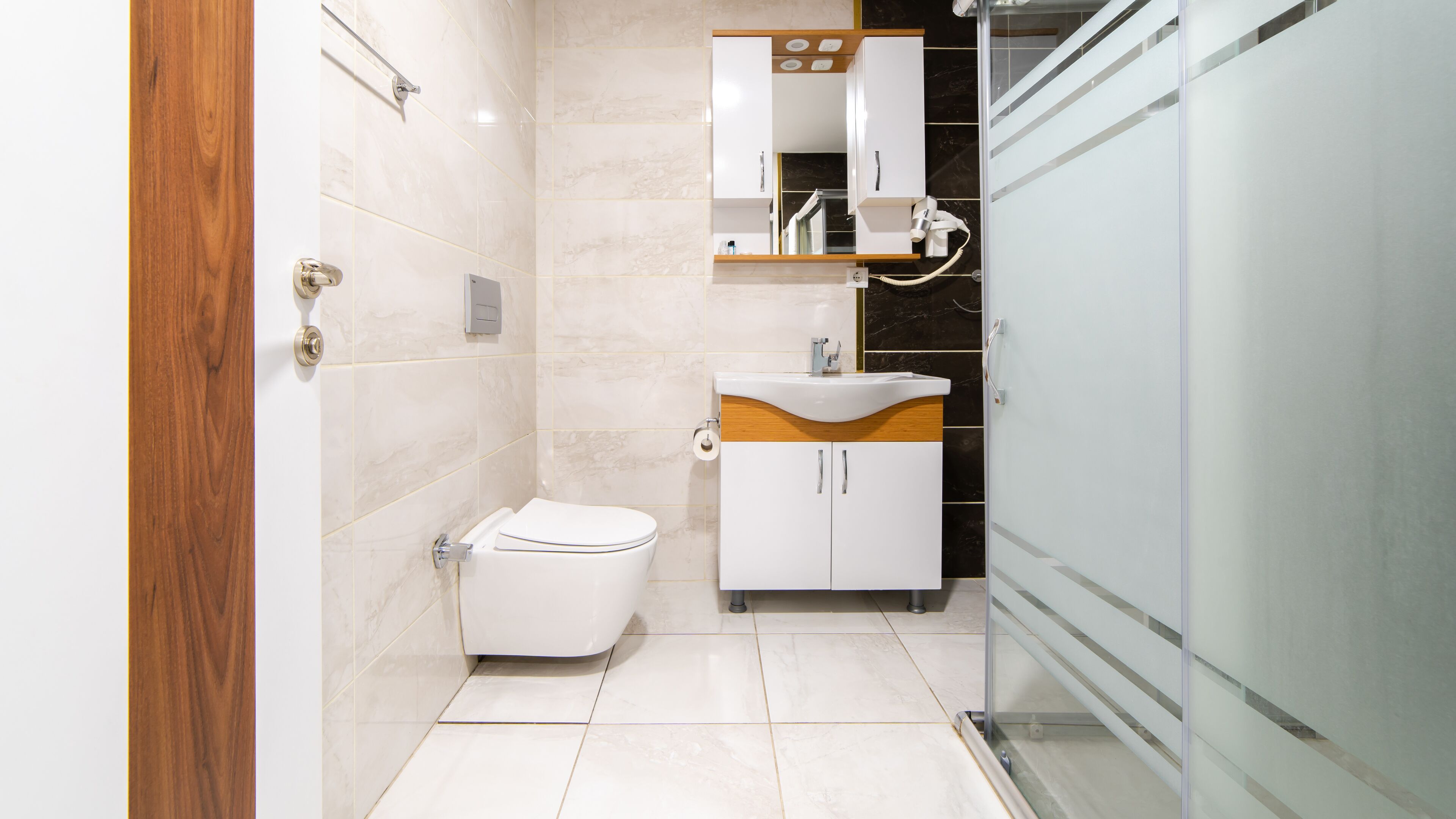 standard studio | bathroom | shower, rainfall showerhead, hair dryer, heated floors