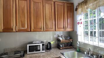 Apartment, 1 Bedroom | Private kitchen | Fridge, coffee/tea maker