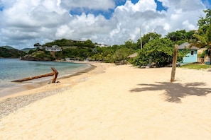 On the beach, sun loungers, beach towels