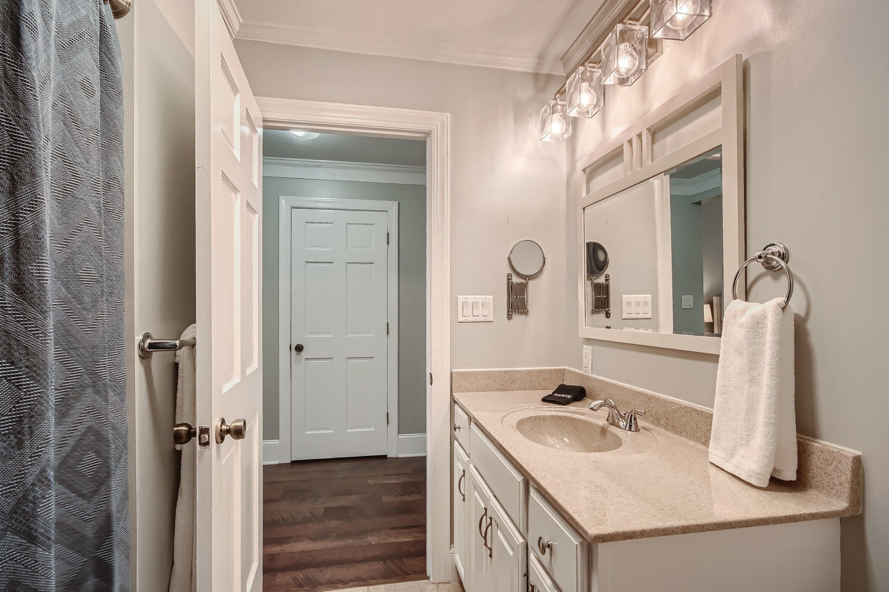 The lower level bathroom has a tub/shower and single vanity.
