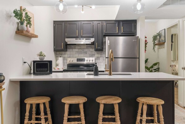 Condo, Multiple Beds, Balcony, Garden View (Midnight Oasis) | Private kitchen | Coffee/tea maker