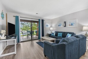 Condo, Multiple Beds, Patio | Living room | 40-inch TV with cable channels - Pointe Pleasure (Branson)