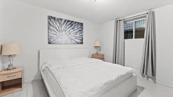 Suite familiar, varias habitaciones | Ropa de cama de alta calidad y camas Select Comfort