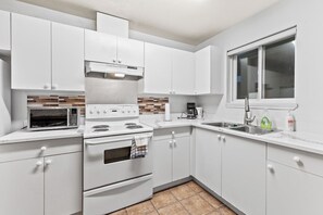 Family Suite, Multiple Bedrooms | Private kitchen | Microwave, toaster, freezer - Family Suite (Surrey)